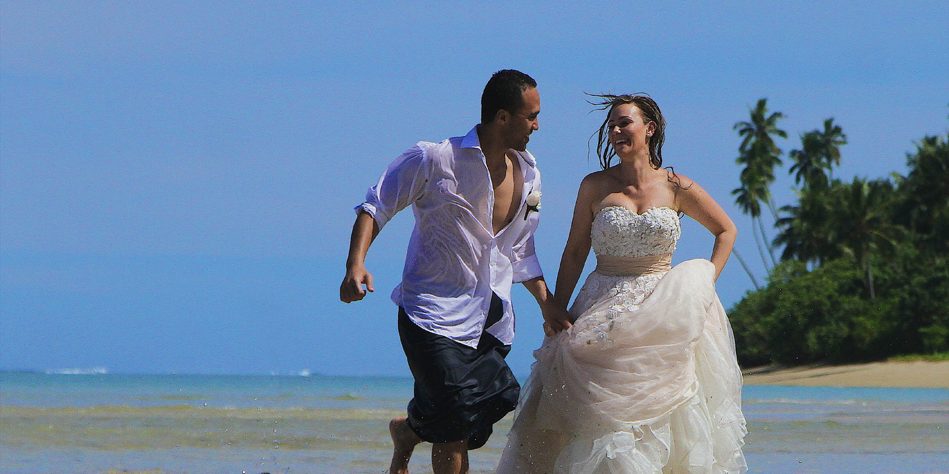 Newlyweds on the beach at Coconuts